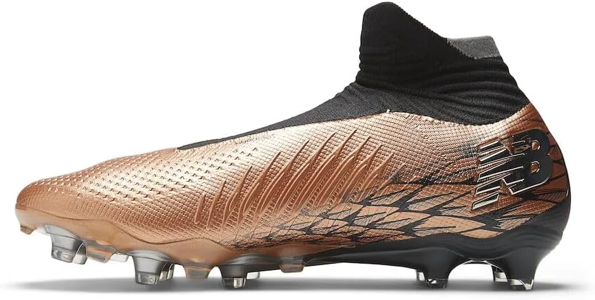 

Футбольные бутсы New Balance Unisex-Adult Tekela V4 Magique Tf, черный/серебристый