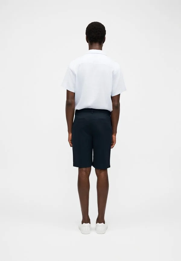Прямые, утонченные, эластичные шорты Calvin Klein, Dark Sapphire — фото 4