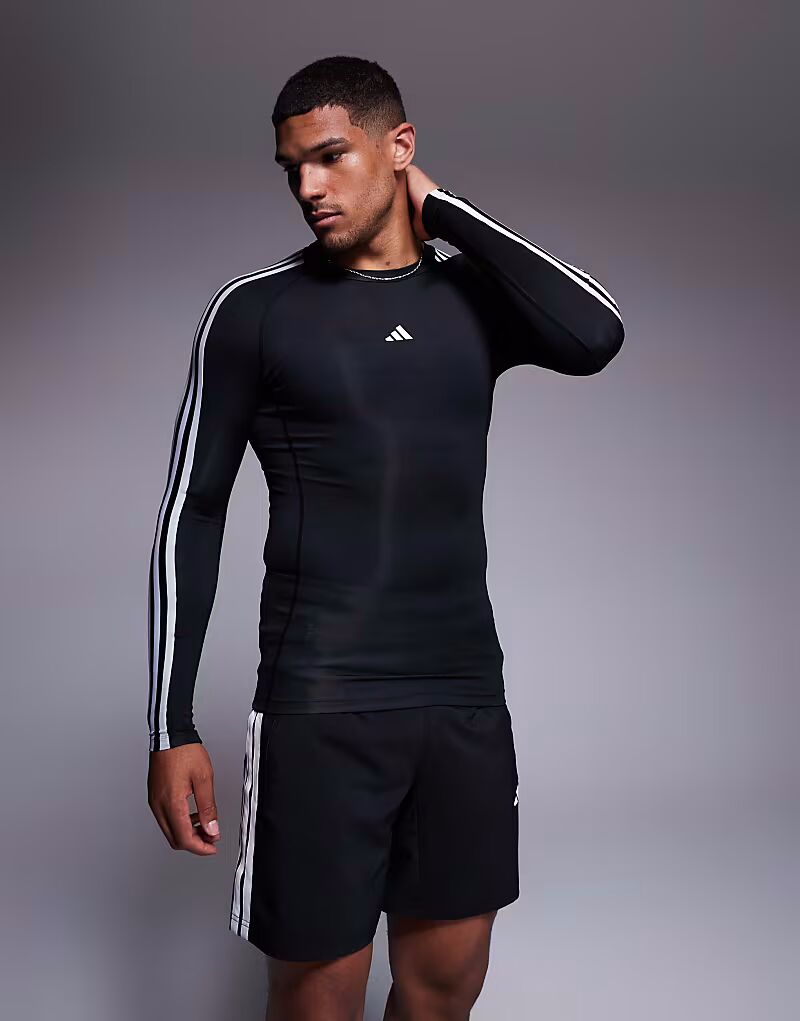 

Футболка с длинными рукавами Adidas Training Tech Fit с тремя полосками черного цвета 3S LS Adidas Performance