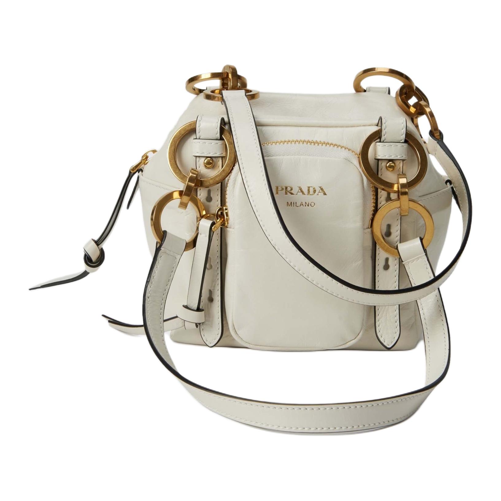 

PRADA Женская мини-сумка через плечо из коровьей кожи белого цвета