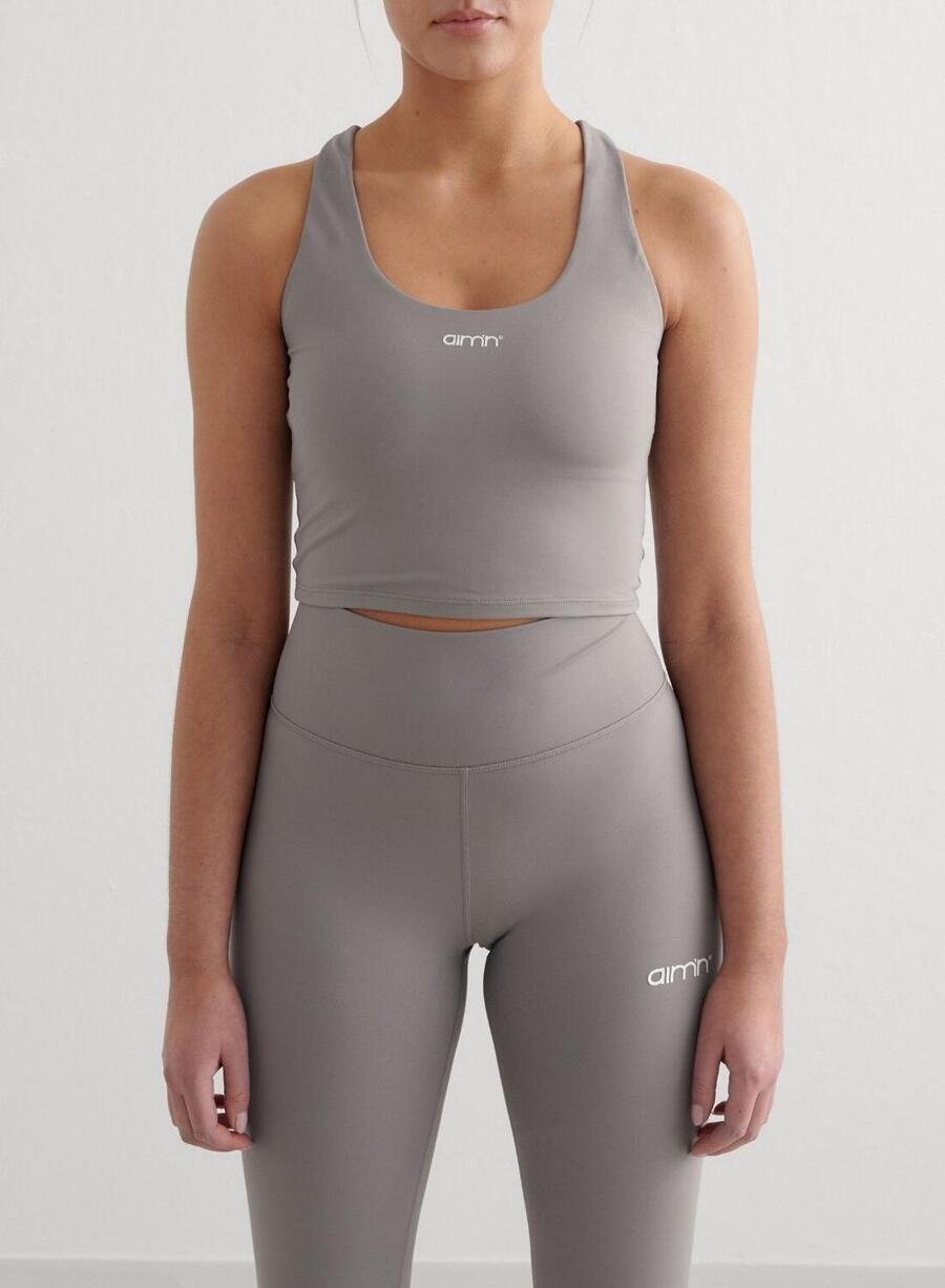 

AIM'N Женский спортивный бюстгальтер для йоги с влагоотводящим эффектом, с перекрещивающимися чашечками на спине, серый