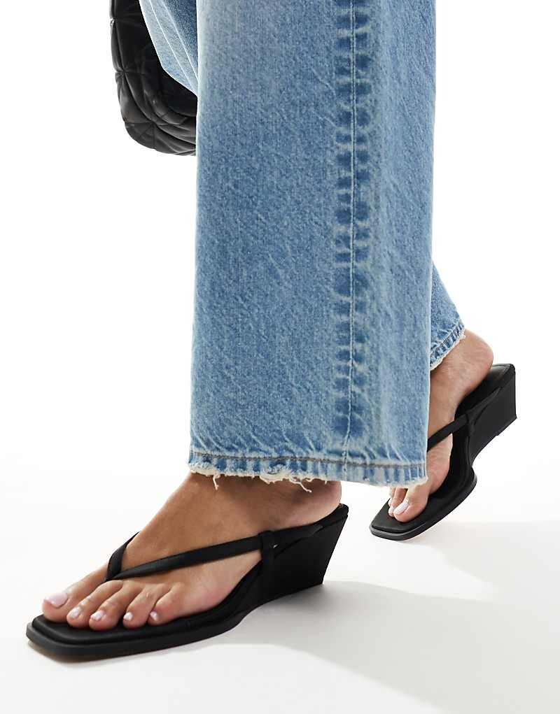 

Черные босоножки с ремешками на танкетке ASOS DESIGN – Tulum