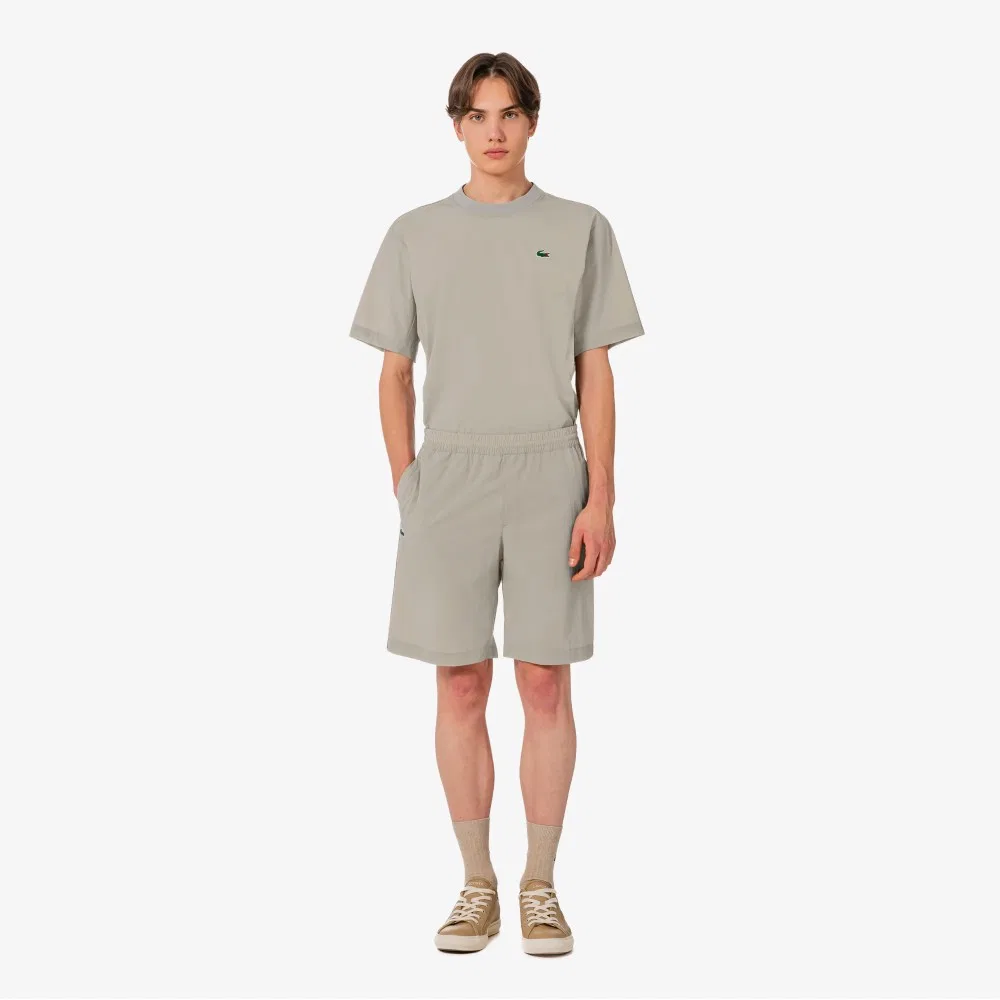 Мужские теннисные тканые шорты-комплект бежевые от Lacoste