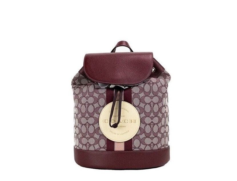 

Рюкзак Dempsey Wine Multi Signature Jacquard Canvas с нашивкой-логотипом Coach