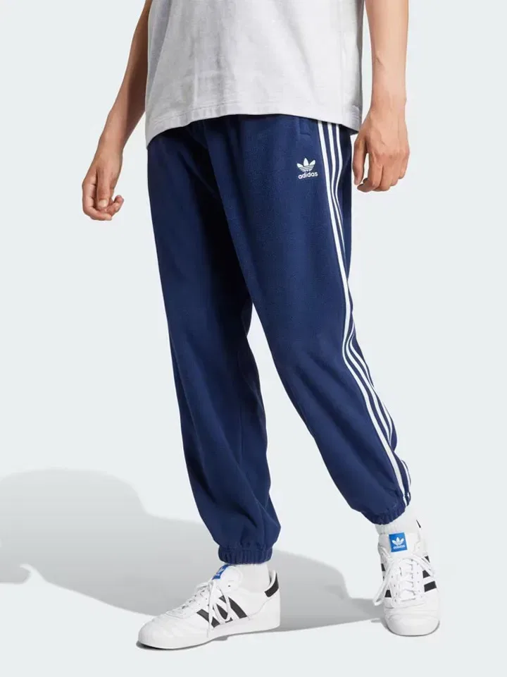 Спортивные штаны свободного кроя Adidas, темно-синий