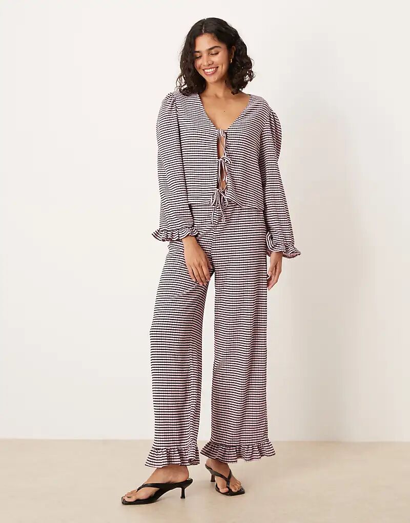 

Широкие брюки ASOS DESIGN с оборкой по низу, черно-розовая клетчатая ткань