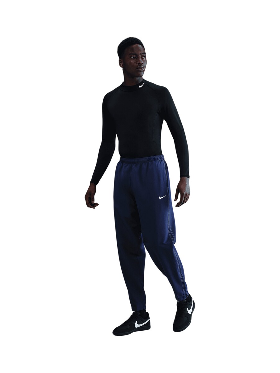 

Зауженные спортивные брюки NIKE Netherlands Reissue, темно-синий