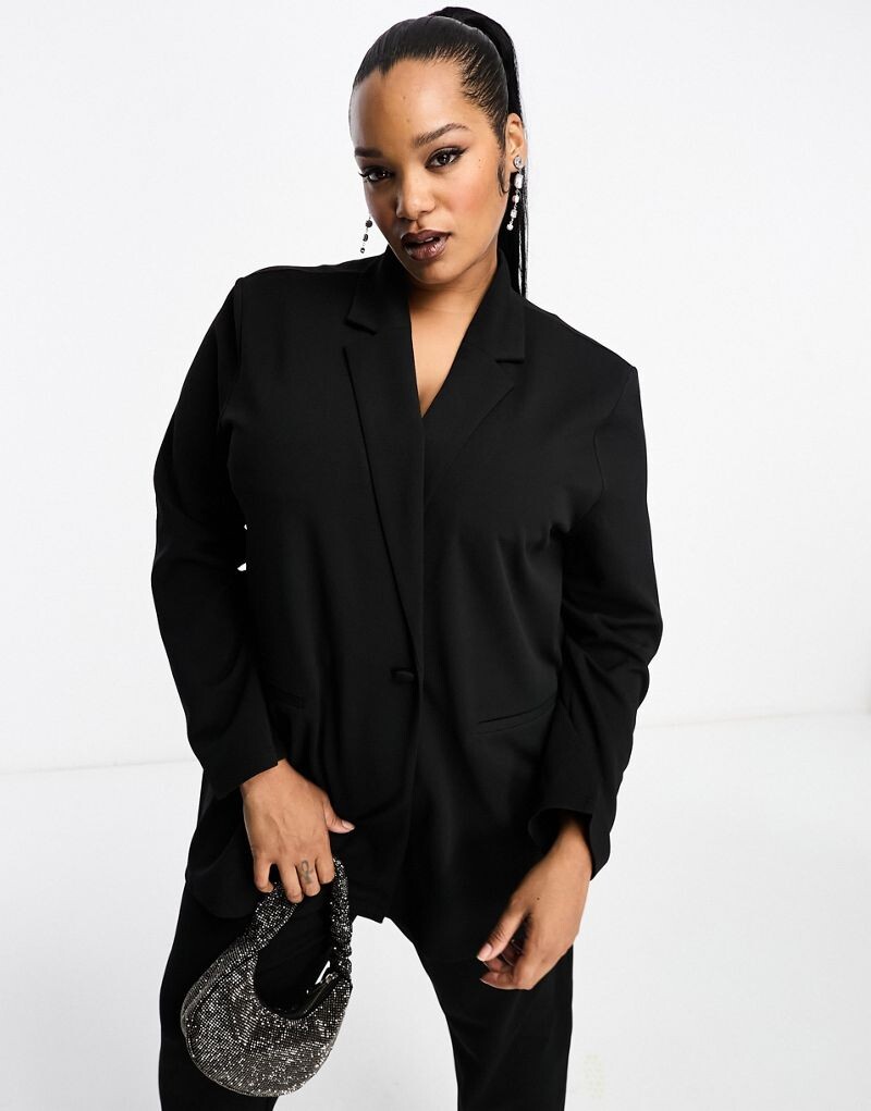 

Черный трикотажный пиджак с напуском ASOS DESIGN Curve