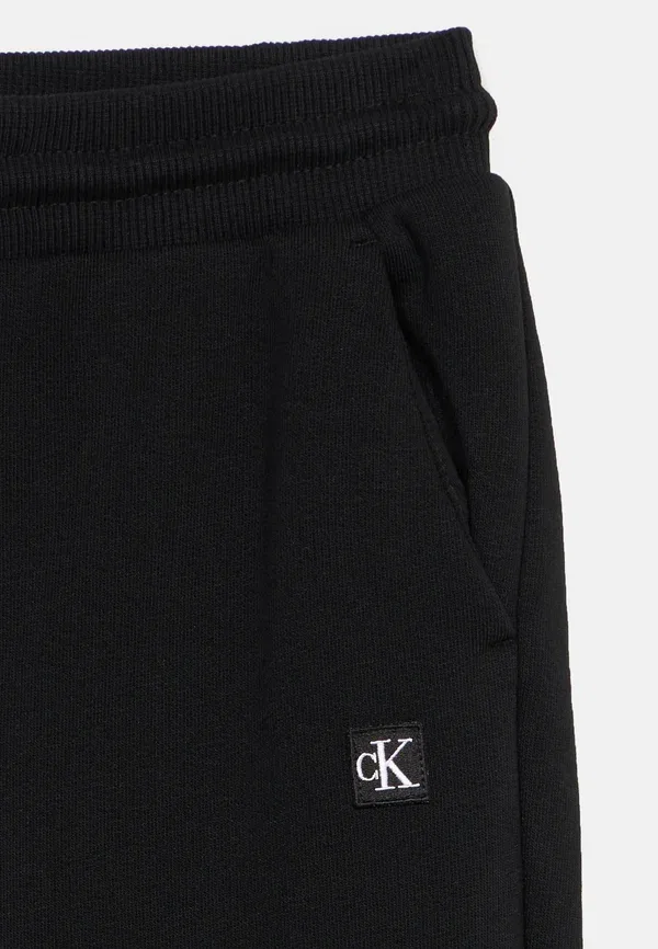 Спортивные штаны с мини-нашивкой Calvin Klein Jeans, черный — фото 4