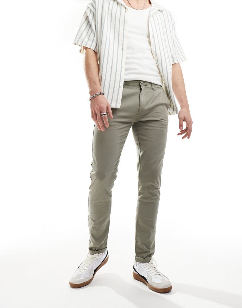 

Выстиранные брюки-чиносы скинни цвета хаки ASOS DESIGN