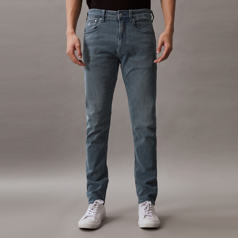 

Джинсы потертые мужские Calvin Klein Jeans с клиновидной формой, серый