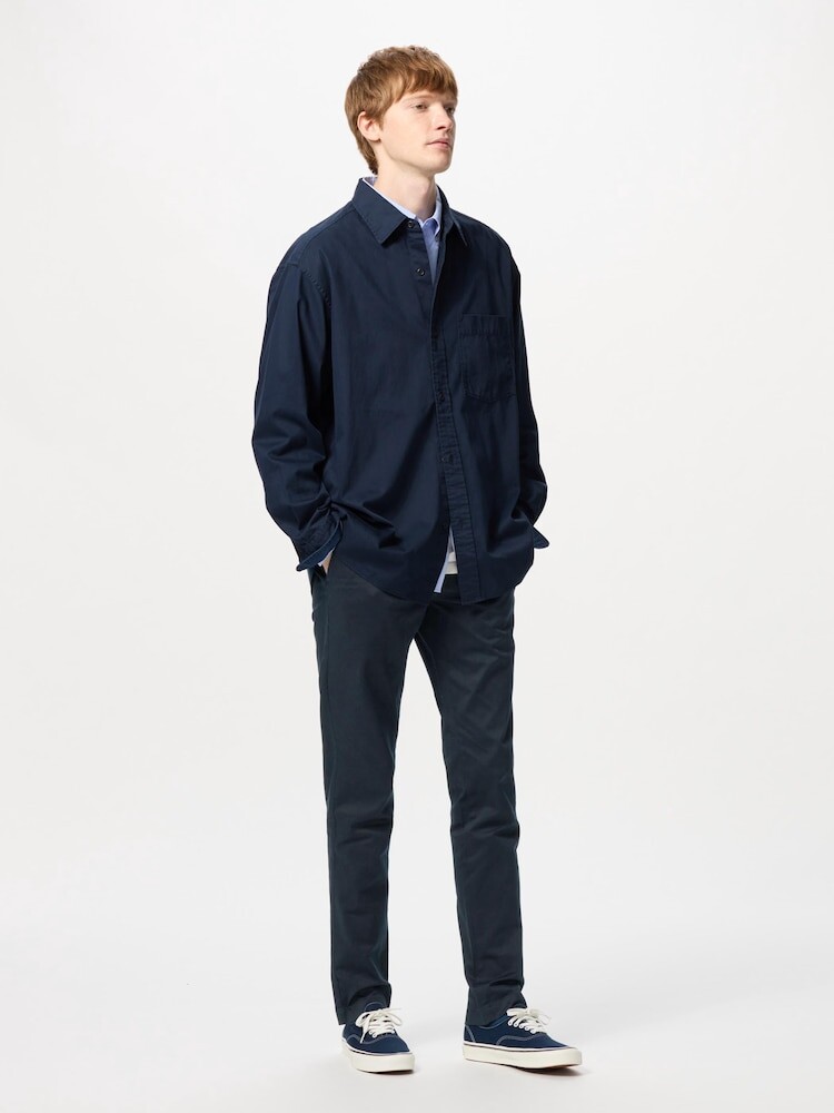 

Узкие брюки-чиносы Uniqlo, цвет 69 синий