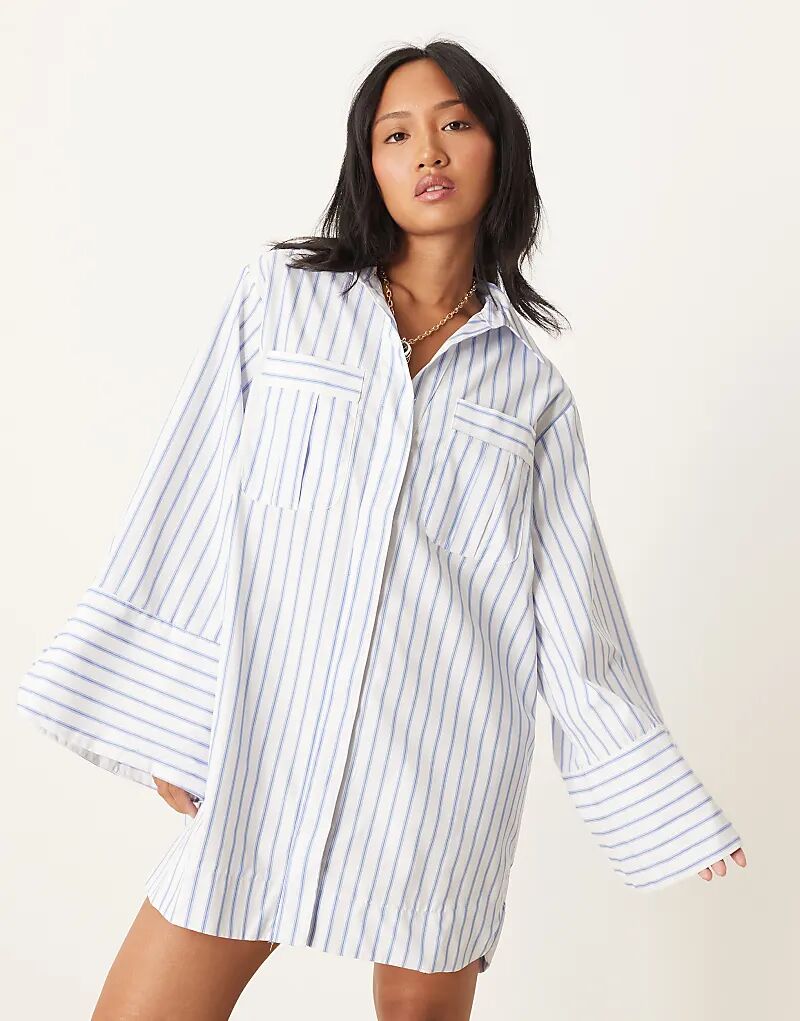 

Платье-рубашка мини ASOS DESIGN Petite с широкими манжетами и объемными карманами в синюю полоску Asos Petite