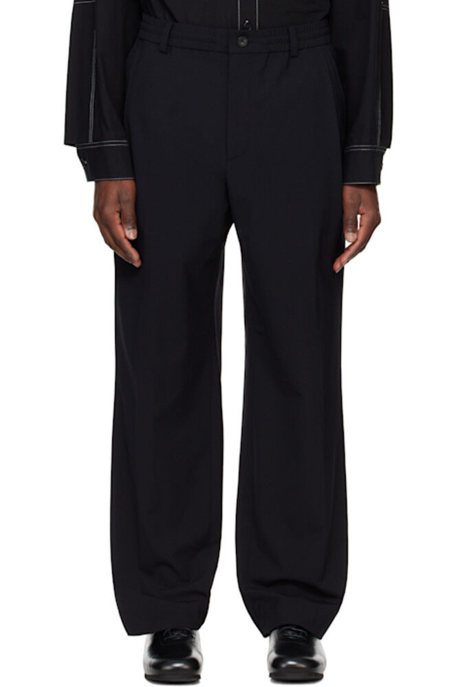 

Черные шерстяные брюки со складками Solid Homme
