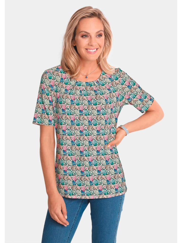 

Футболка с разноцветным принтом, короткими рукавами и круглым вырезом в красочных узорах. GOLDNER