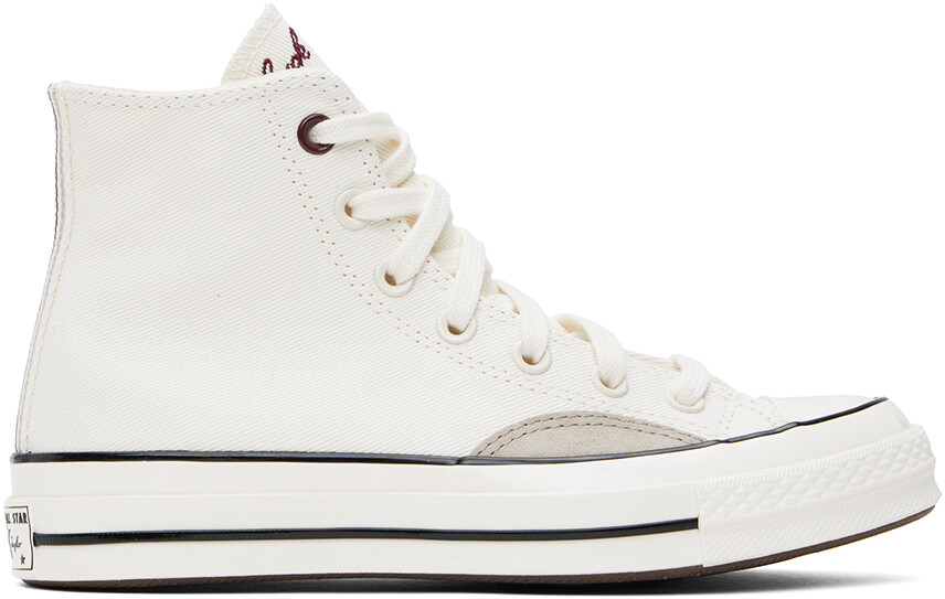 

Бело-серо-серо-коричневые высокие кеды из разных материалов Chuck 70 Converse