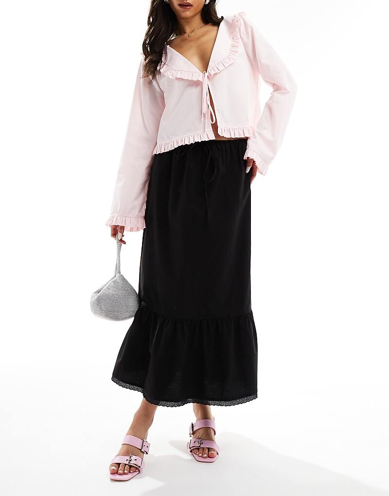 

ASOS DESIGN – черная юбка макси с широкой рюшой внизу