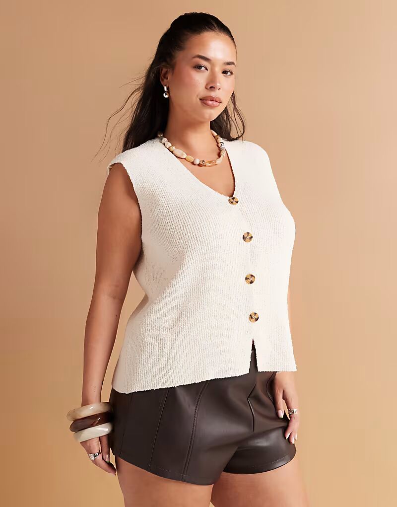 

Жилет свободного кроя ASOS DESIGN Curve из трикотажного полотна кремового цвета ASOS Curve