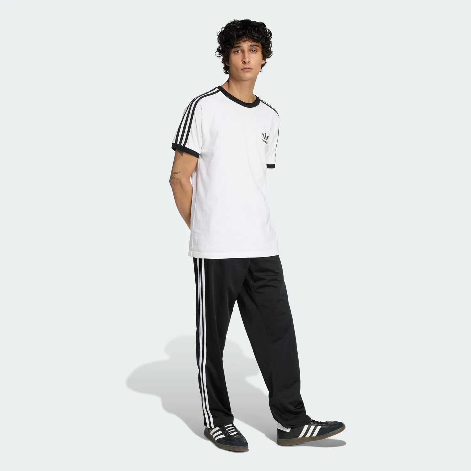 Женские тренировочные брюки Firebird чёрные от Adidas — фото 3