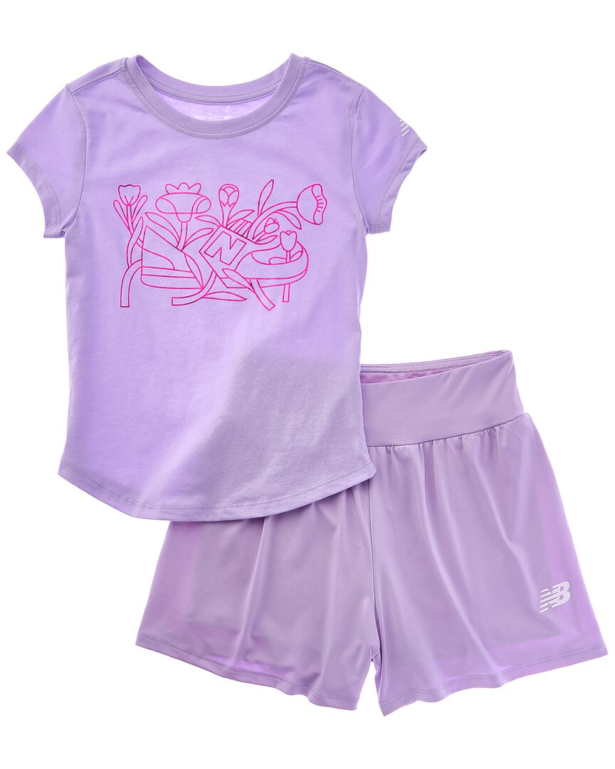 

Комплект New Balance из двух предметов: футболка и свободные шорты, фиолетовый
