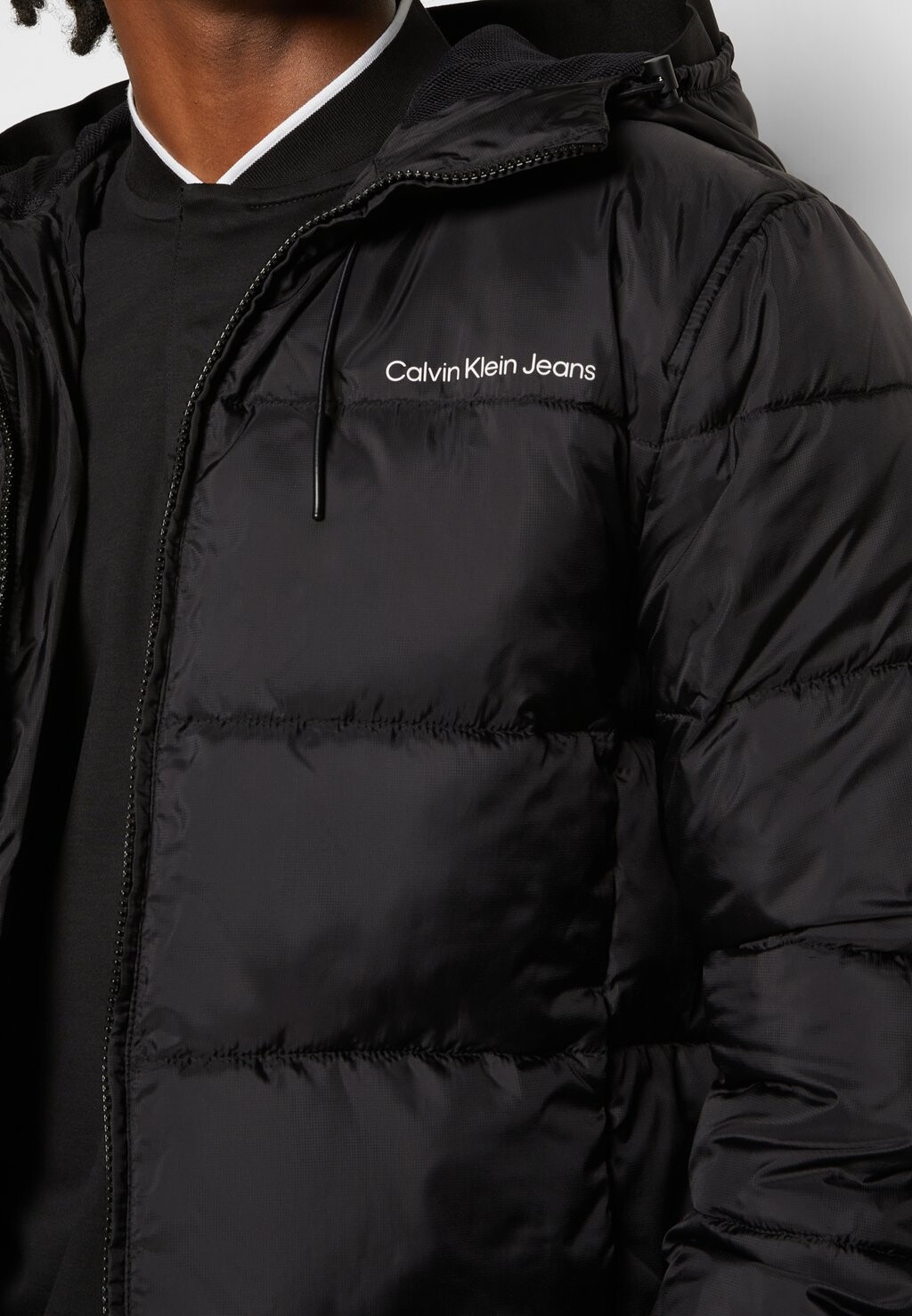 

Зимняя куртка LOGO TAPE PADDED JACKET Calvin Klein Jeans, черный