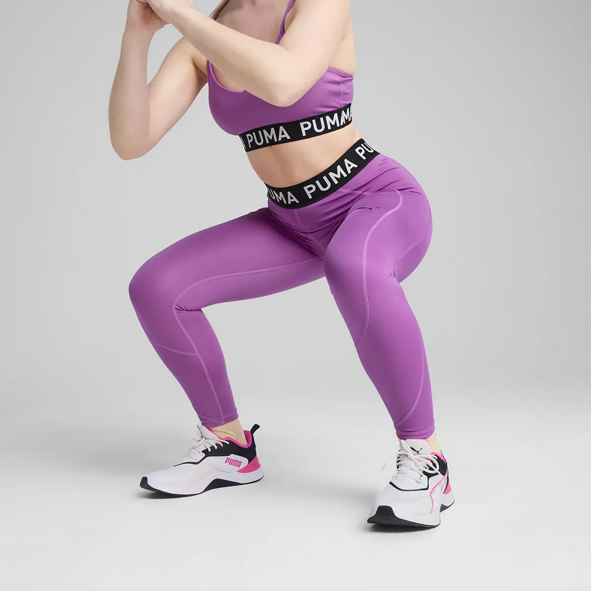 

W PUMA STRONG COLORBLOCK ЖЕНСКИЕ ОБТЯГИВАЮЩИЕ ЖЕНСКИЕ ЛЕГГИНСЫ - HW FL Puma, пурпурный
