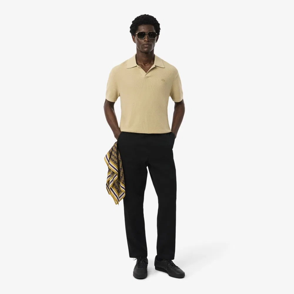 Мужские чёрные эластичные брюки прямого кроя с эластичным поясом от Lacoste — фото 4
