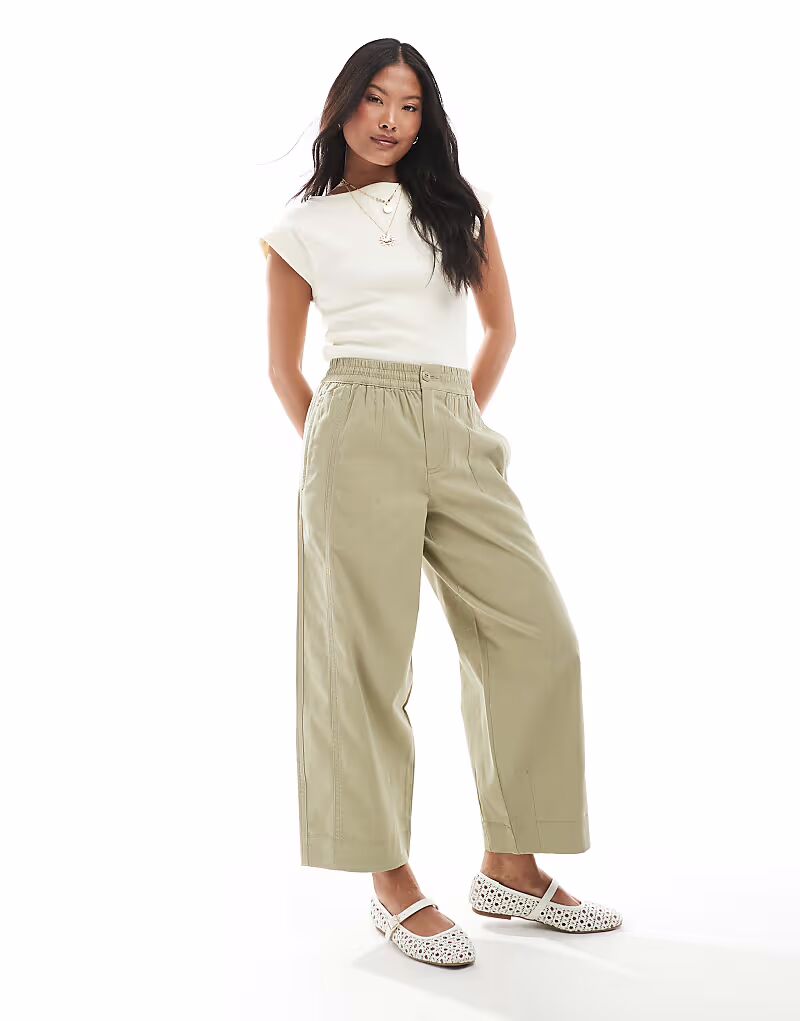 

Брюки ASOS DESIGN Petite из стираной ткани с застежкой-молнией цвета хаки
