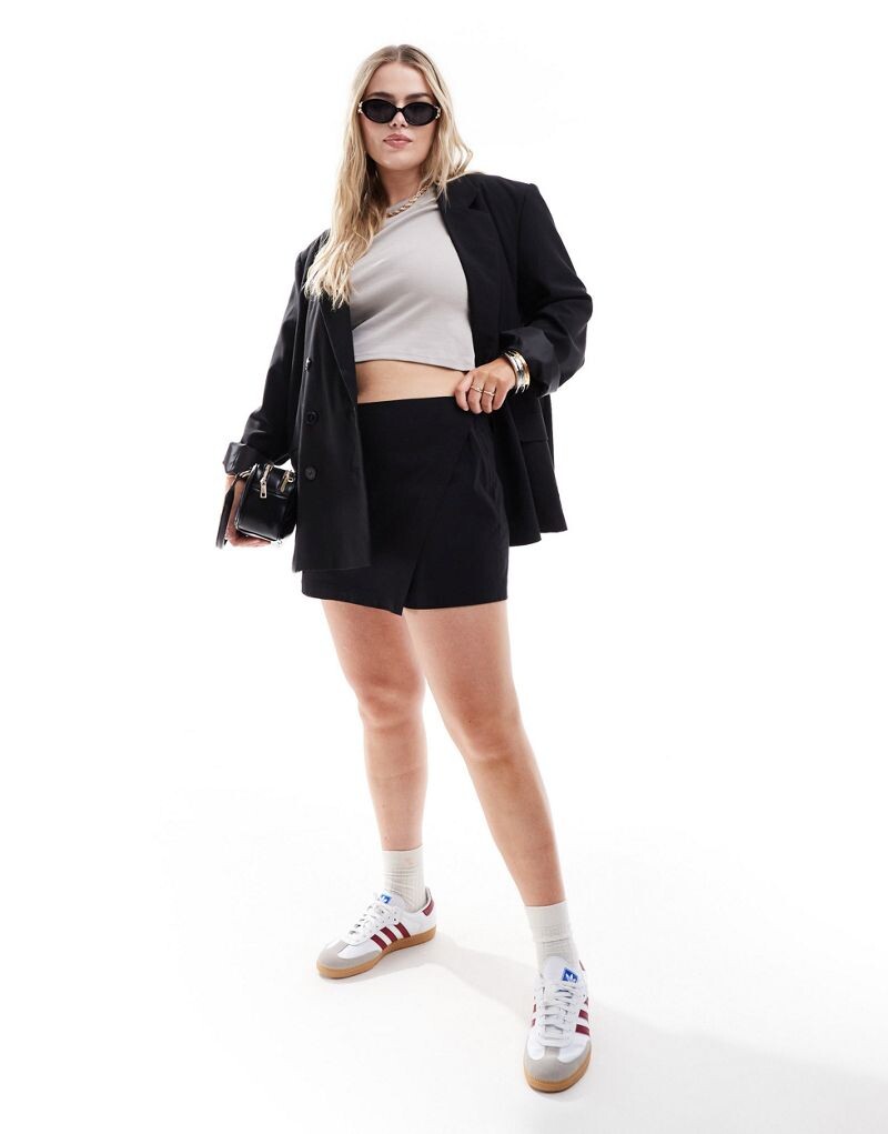 

Черная бенгальская юбка асимметричного кроя с запахом ASOS DESIGN Curve