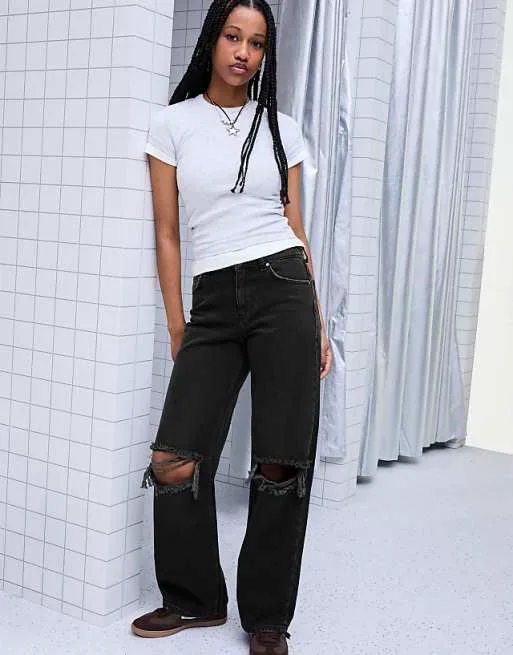 

Черные рваные джинсы с высокой посадкой и широкими штанинами Bershka