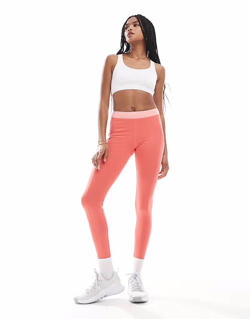 

Born Living Yoga - Xenia - Леггинсы в цвете Strawberry Ice Cream/Sunset Coral
