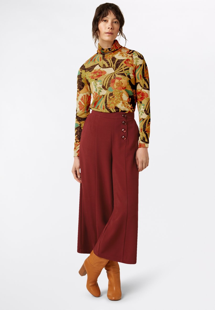 

Топ King Louie ROLLNECK DAZZ, Black