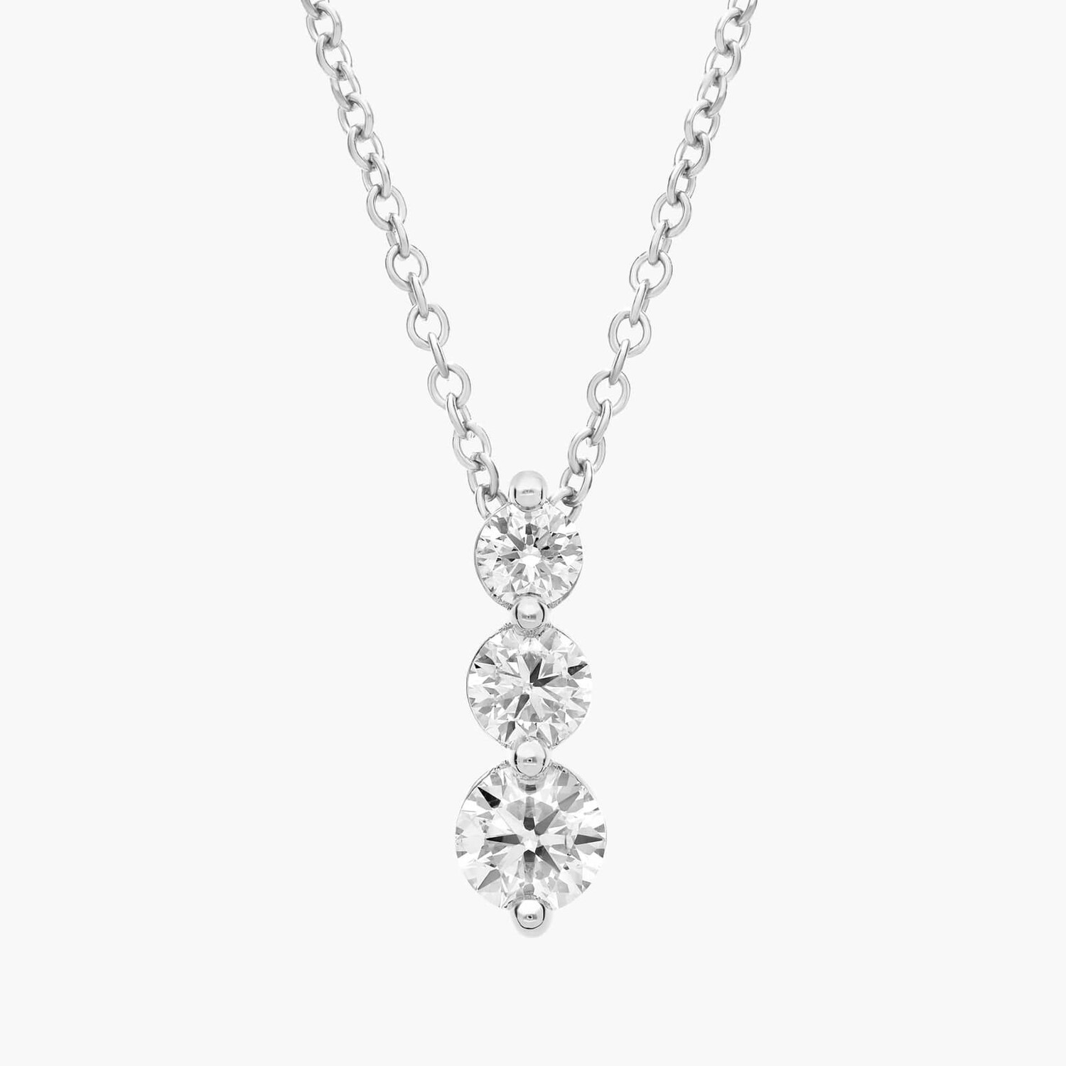 

Подвеска с тремя бриллиантами-капельками из 18-каратного белого золота (1 карат, два камня) Blue Nile