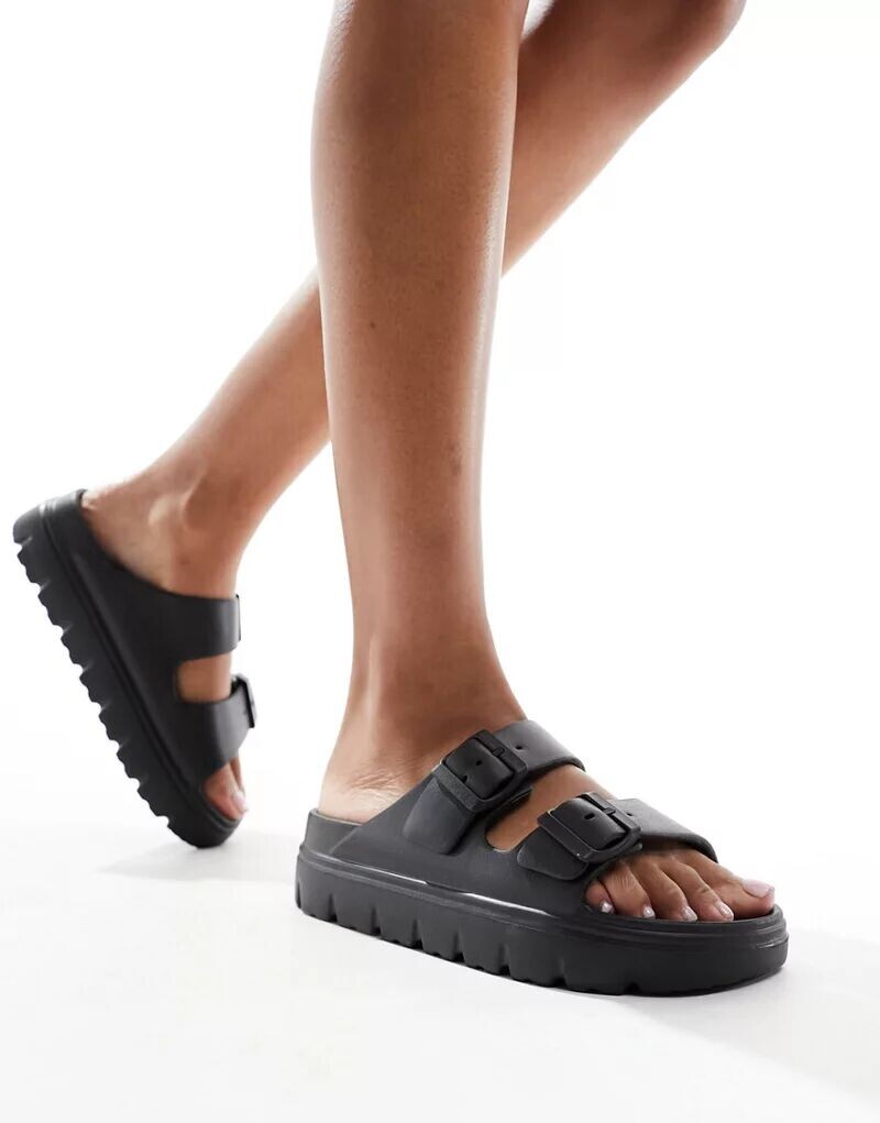 

schuh – Tilda – шлепанцы черного цвета с двумя пряжками