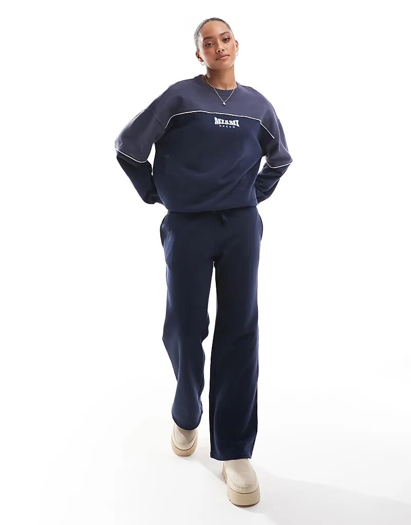 

Спортивные брюки Hollister Navy с контрастными вставками и логотипом (часть комплекта)