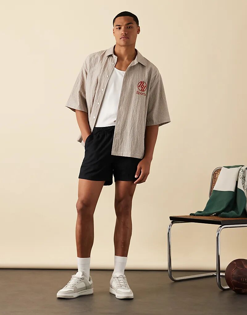 

Рубашка свободного кроя ASOS DESIGN в коричневую клетку с вышивкой на груди