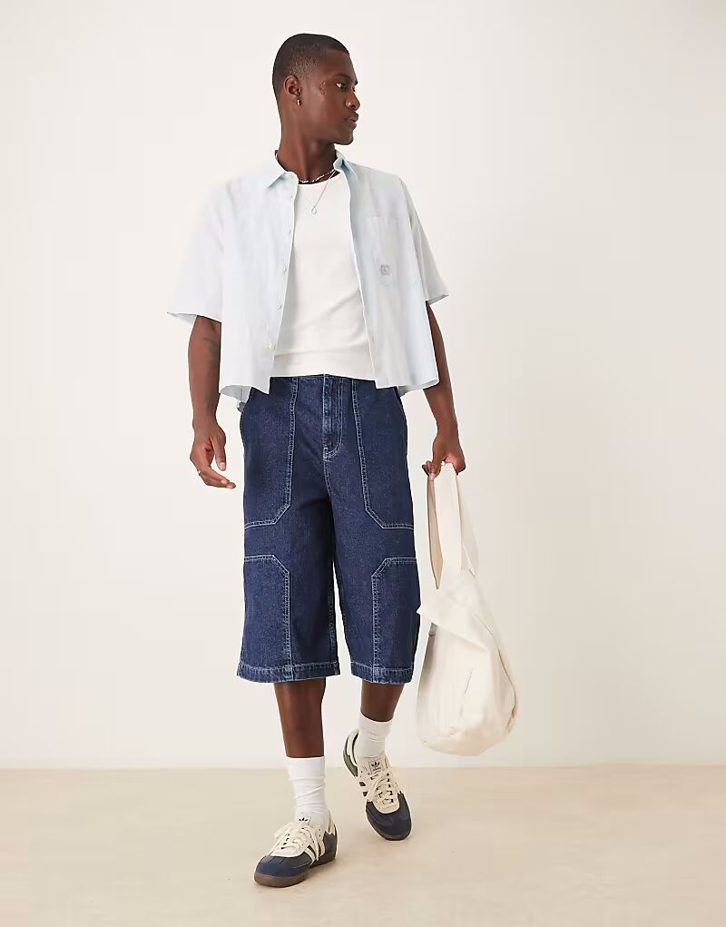 

Джинсовые шорты ASOS DESIGN удлиненной длины, необработанные