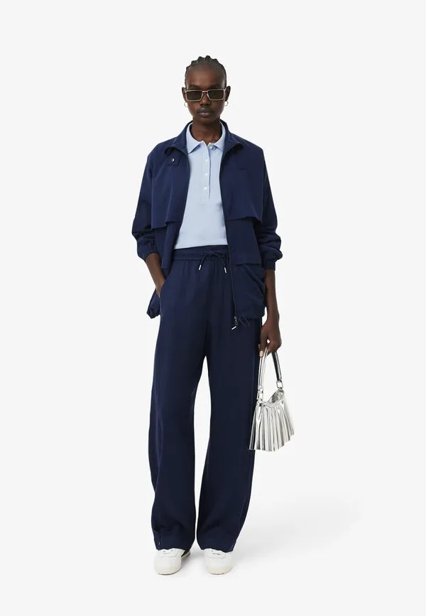 Поло Lacoste Bleu Clair-Hba без рукавов, приталенный крой, однотонный — фото 2