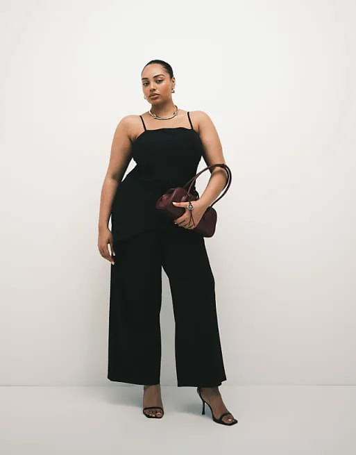 

Черные облегающие брюки из твила ASOS DESIGN Curve с запахом на юбке