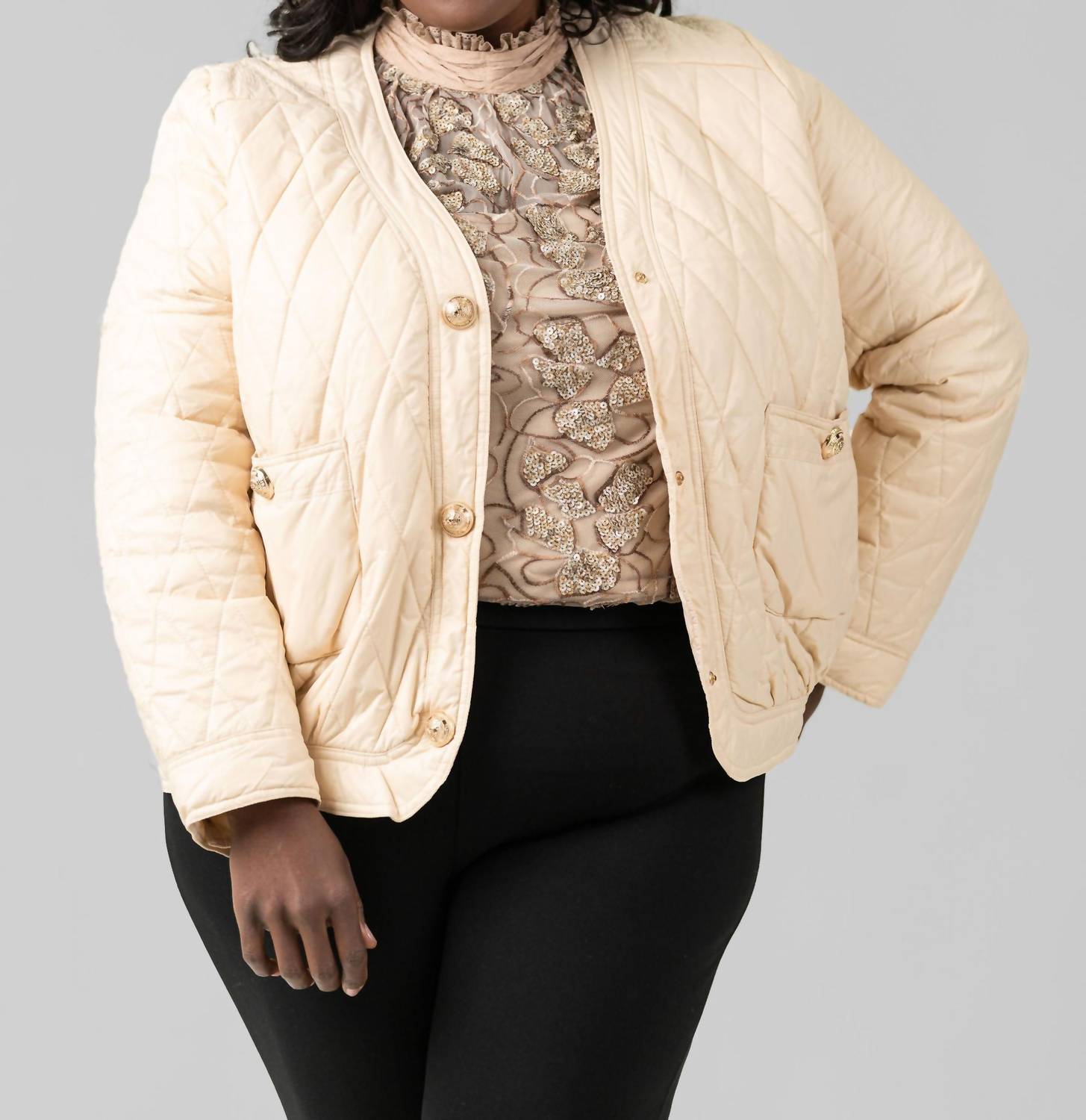 

Стеганая пуховая куртка бежевого цвета Joh