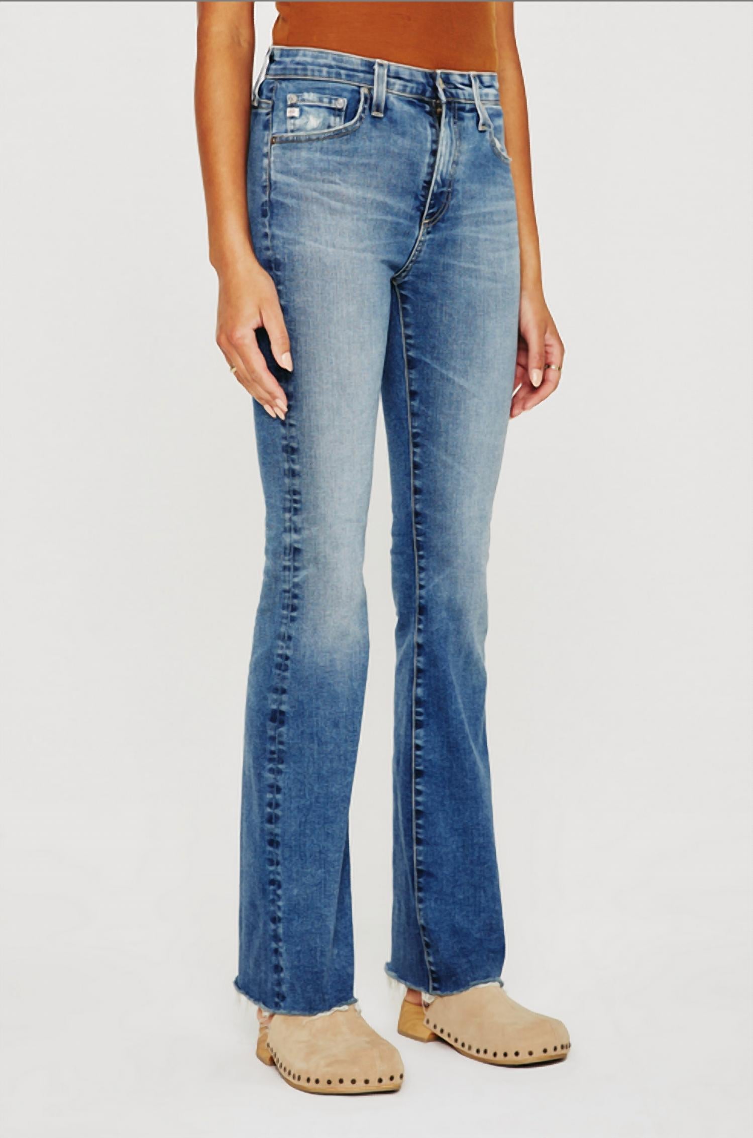 

Джинсы Farrah Boot Jeans цвета индиго средней интенсивности AG Jeans