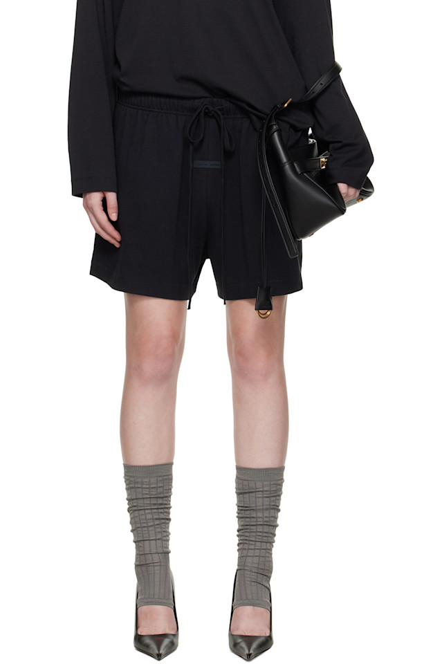 

Fear Of God Essentials Черные футбольные шорты