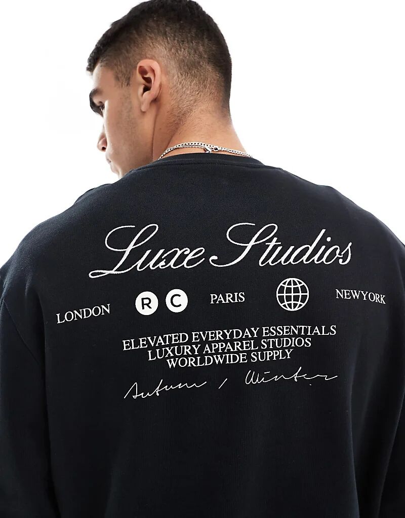 

Толстовка оверсайз с принтом «luxe studios» черного цвета ASOS DESIGN
