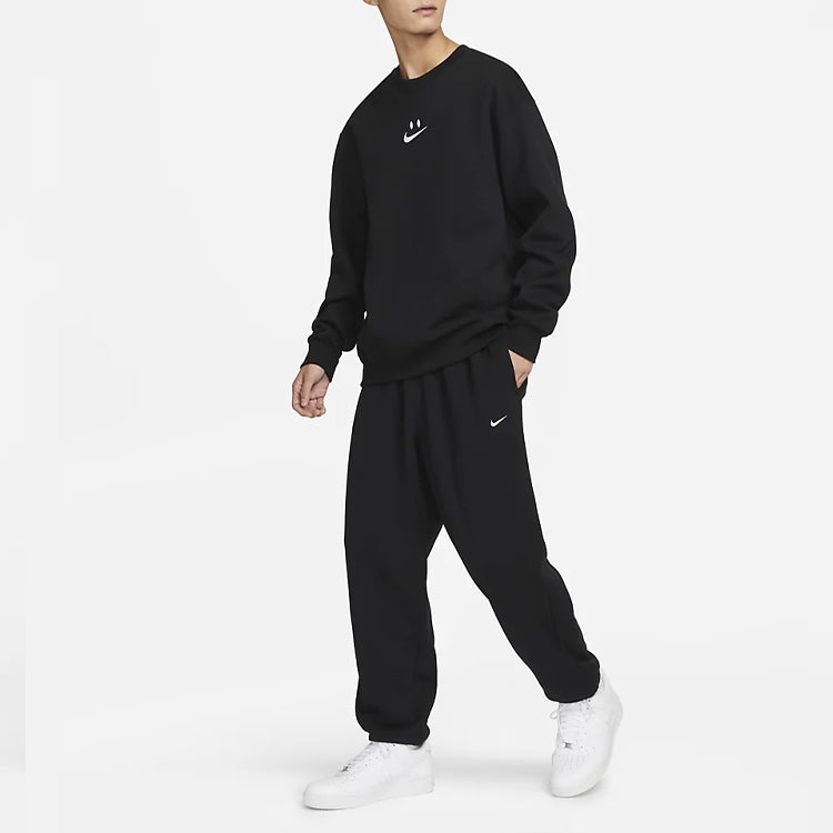 Повседневные брюки Nike Logo French Terry Pants FB2814-010 — фото 3