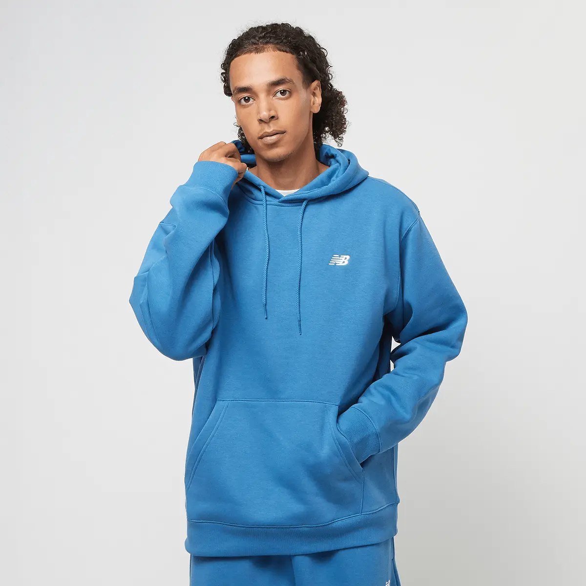 

Худи New Balance Sport Essentials Fleece, синий