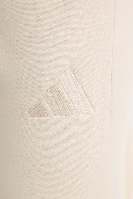 Спортивные штаны из футера Adidas, бежевый — фото 4