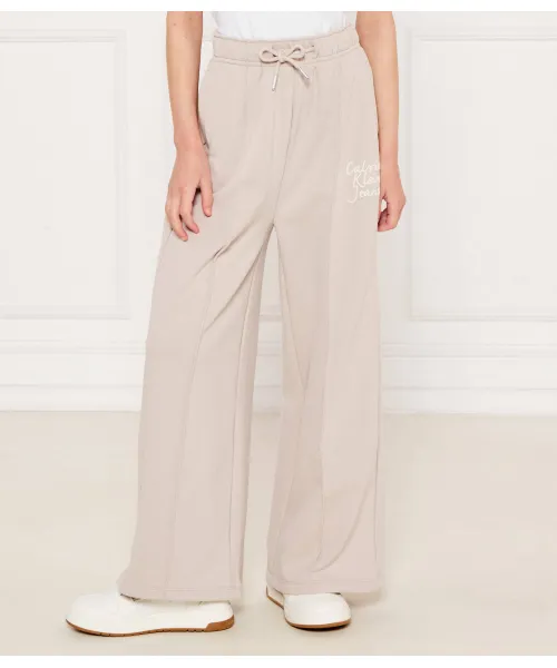 

Спортивные штаны Flare fit Calvin Klein Jeans, бежевый