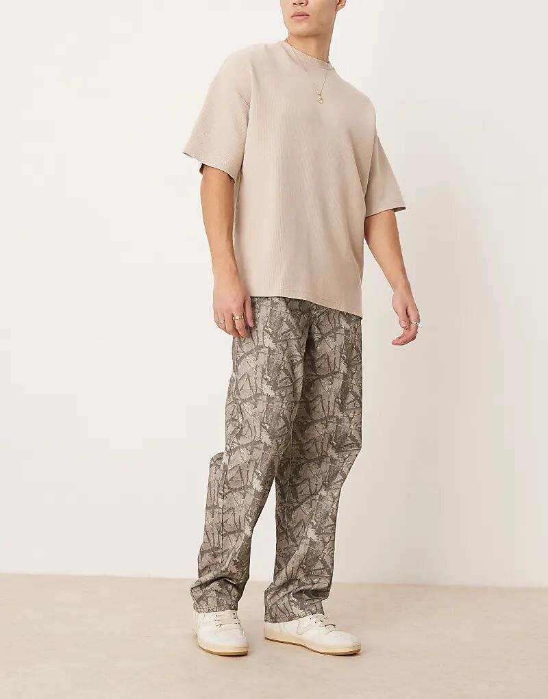 

Очень мешковатые брюки с камуфляжным принтом ASOS DESIGN