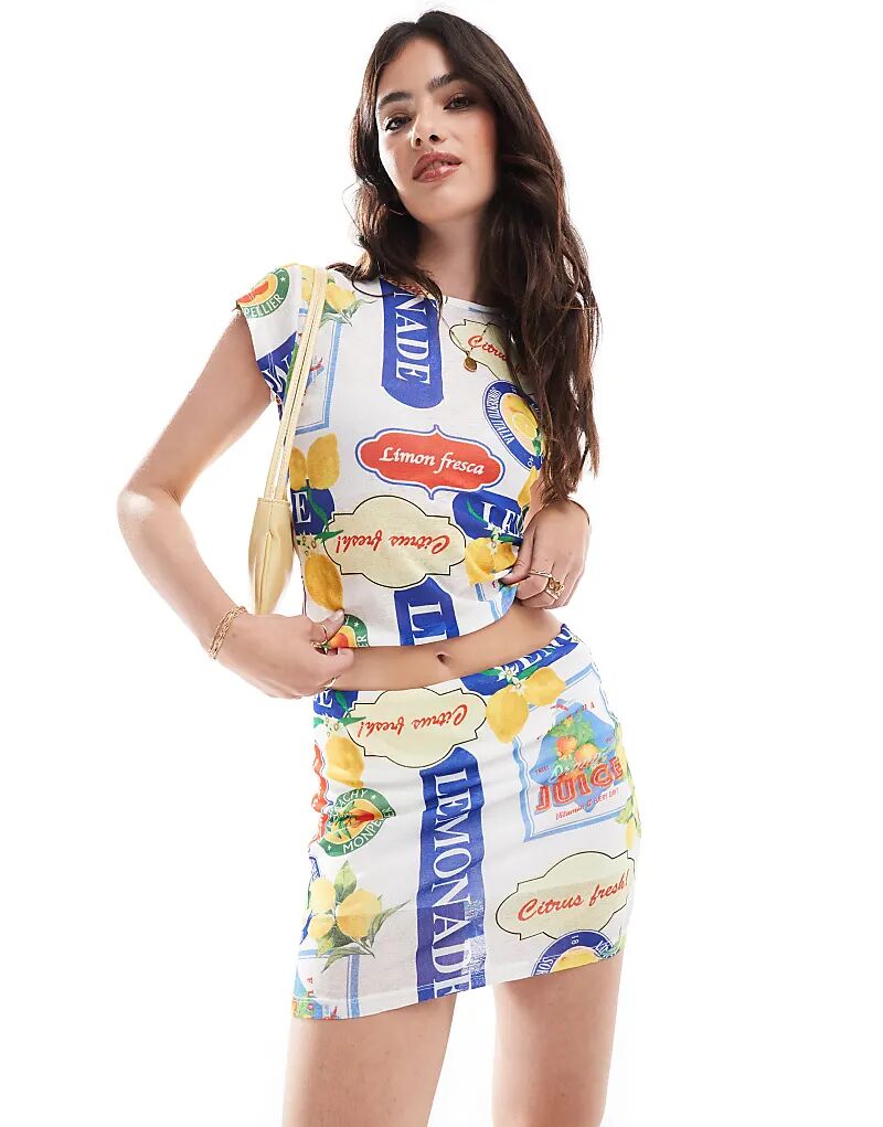 

Мини-юбка с фруктовым принтом и сеткой ASOS DESIGN