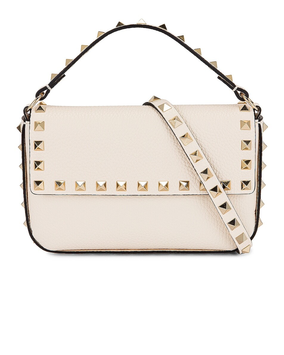 

Valentino Garavani Клатч Garavani Rockstud, цвет Light Ivory